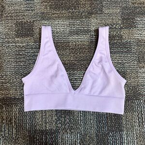 Cute lilac workout top by WeWoreWhat!!!!
Super great quality, never worn